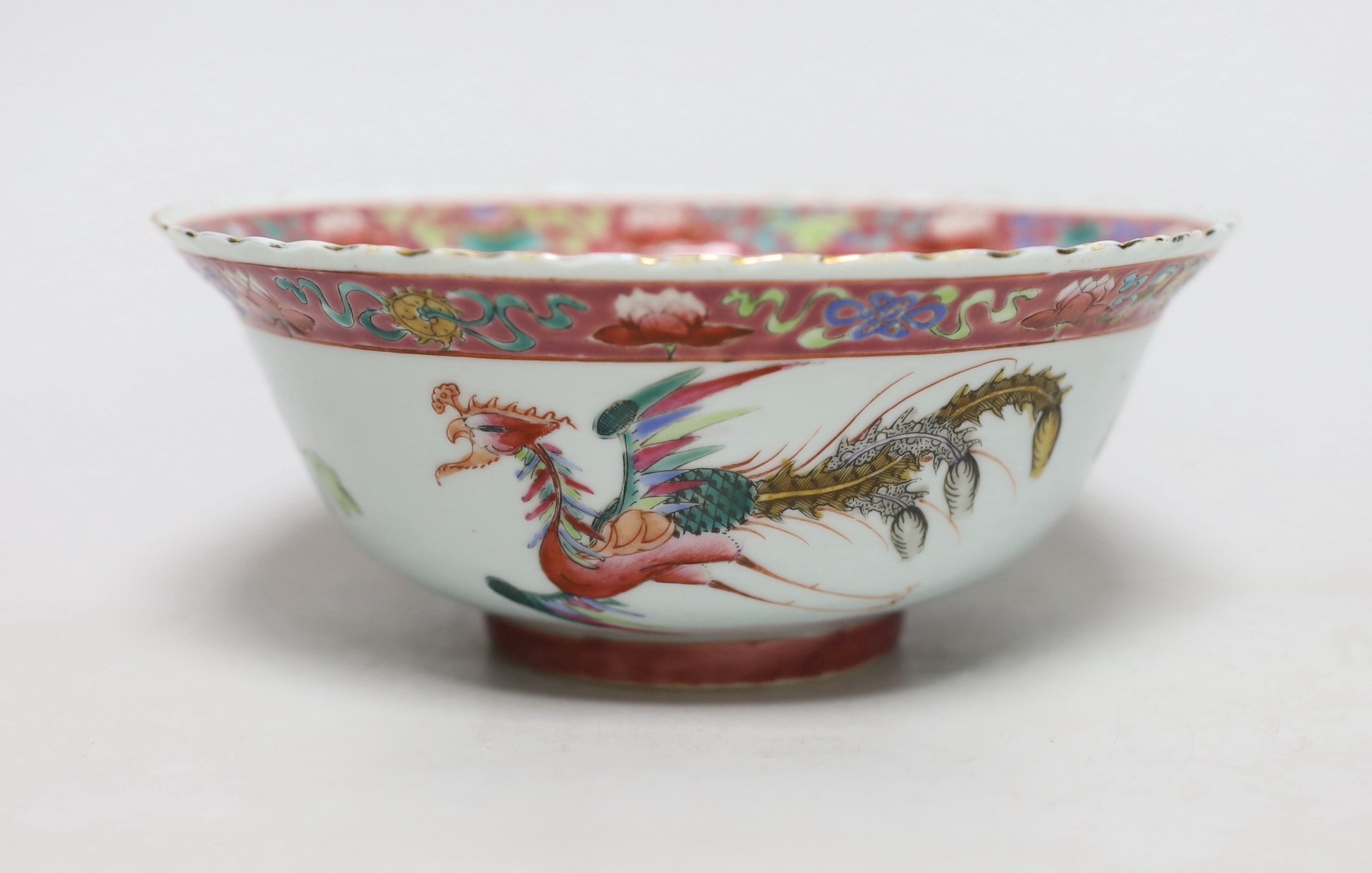 A Chinese Straits famille rose ‘phoenix’ bowl, 19cm diameter